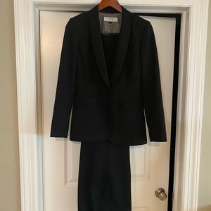 Navy pinstripe pants suit.